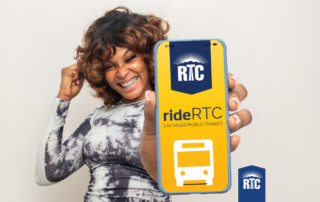 Happy customer showing off her rideRTC app